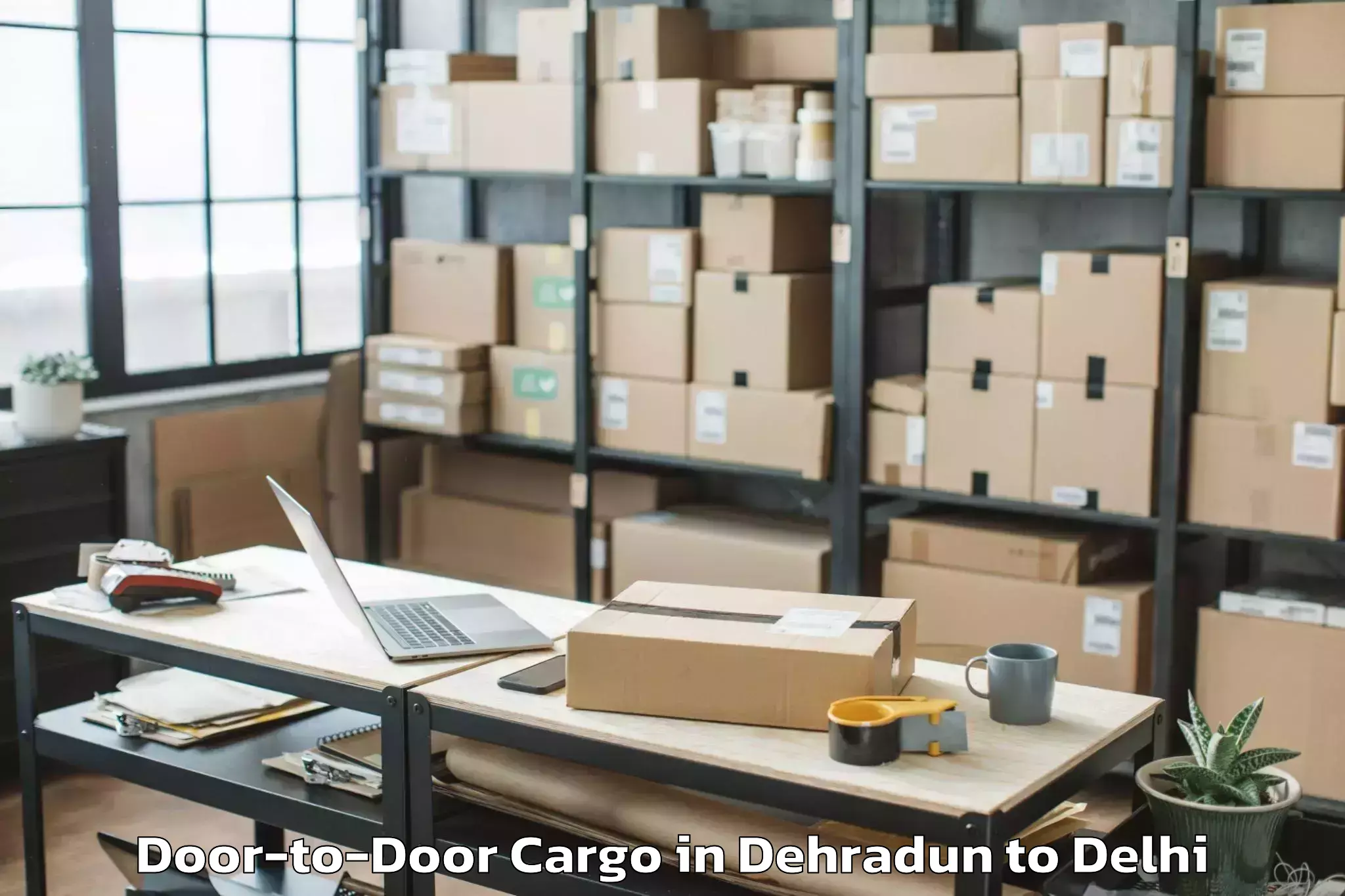 Trusted Dehradun to Rajouri Garden Door To Door Cargo